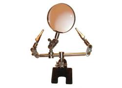 Dritte Hand mit Lupe